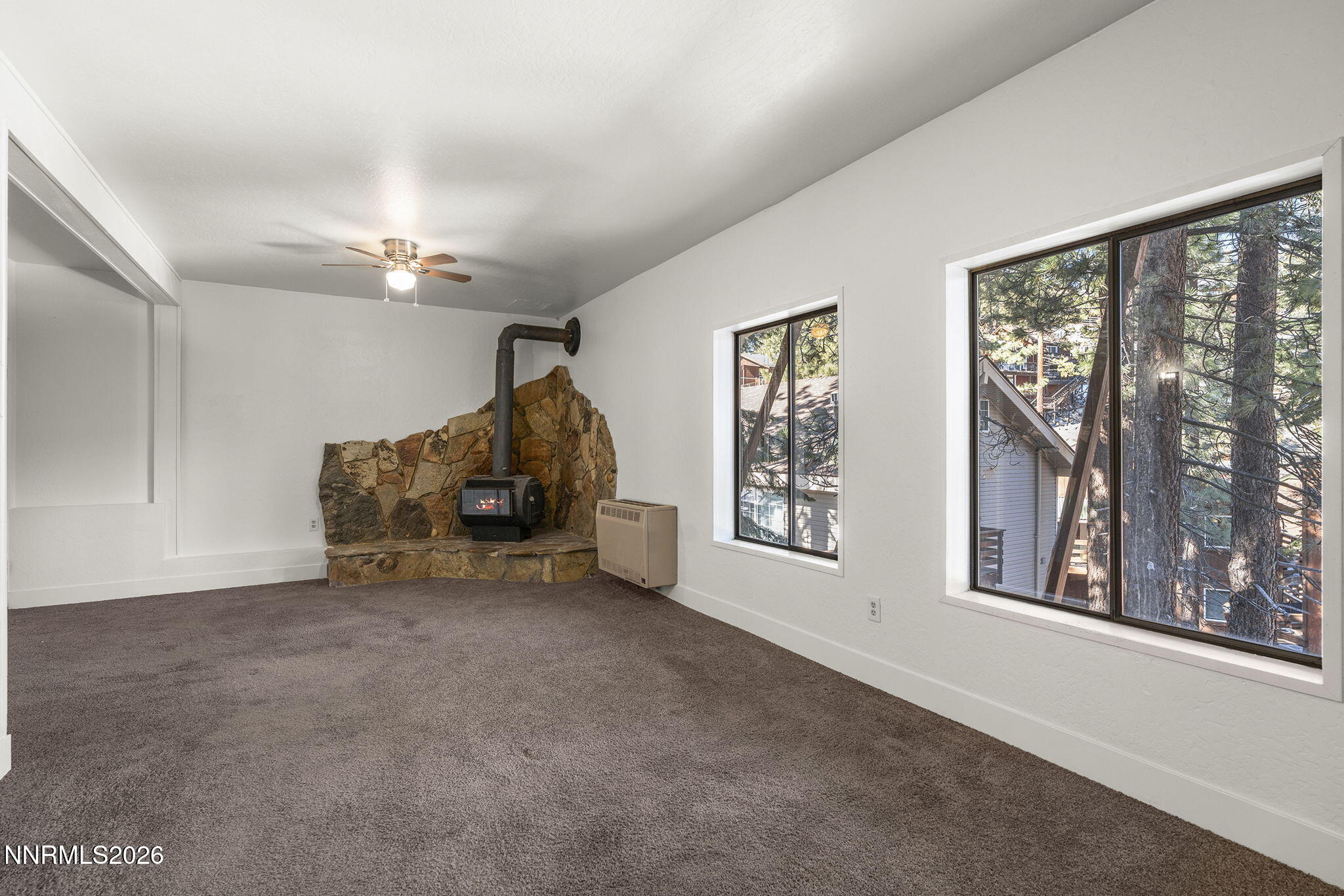 179 Tramway Drive, Unit B Stateline, NV 89449 - Photo 19 of 29 a view of an empty room with a window