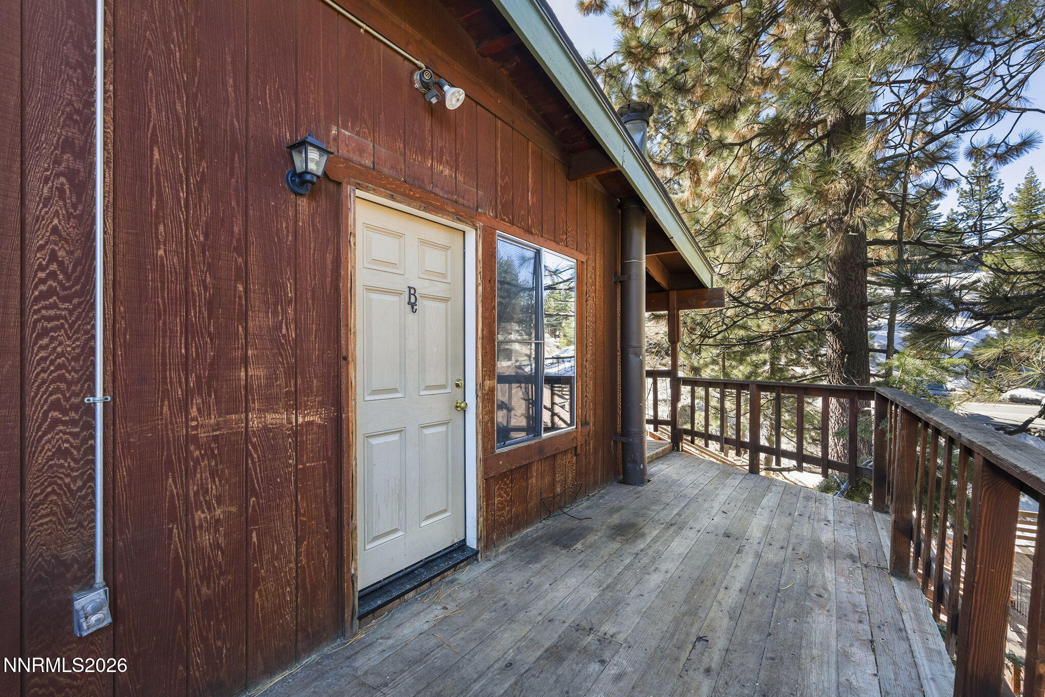 179 Tramway Drive, Unit B Stateline, NV 89449 - Photo 3 of 29 a view of a porch with wooden floor and outdoor space