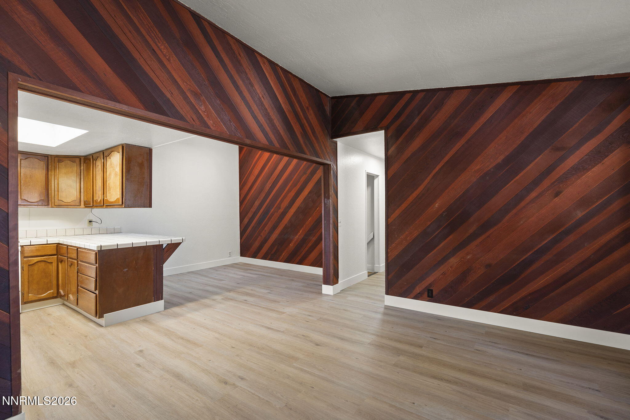 179 Tramway Drive, Unit B Stateline, NV 89449 - Photo 7 of 29 a view of a hallway with wooden floor and entryway