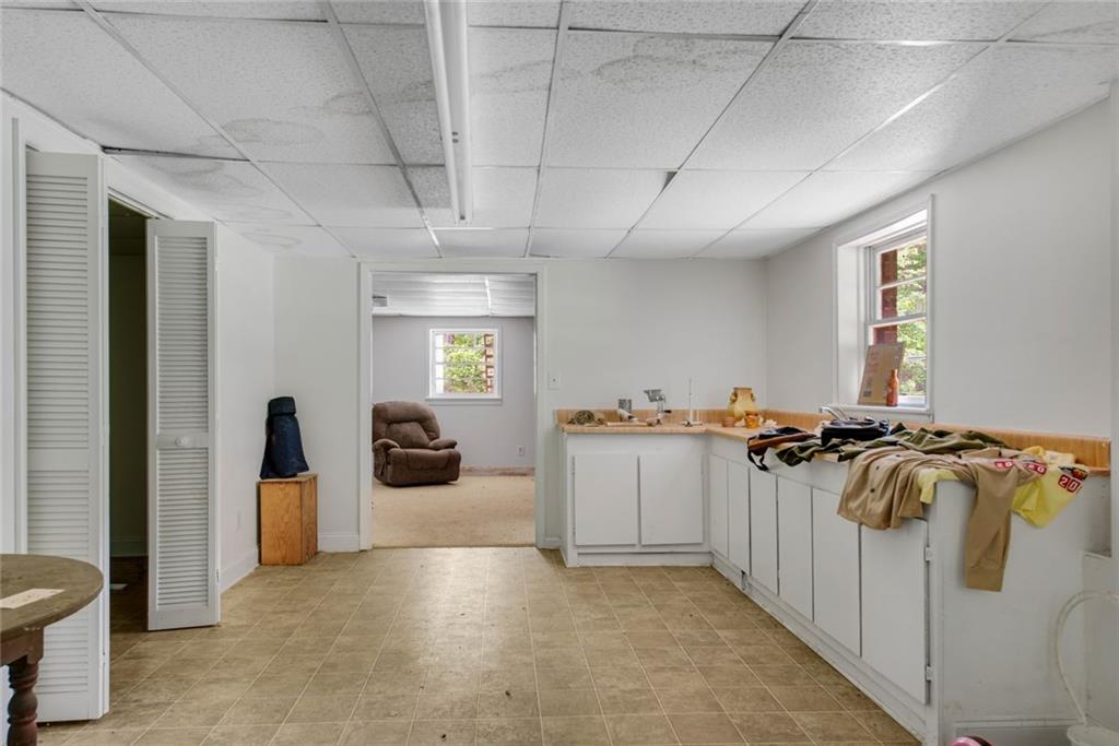 1955 Flat Shoals Road Southeast Conyers, GA 30013 - Photo 37 of 56 a view of a livingroom with a bathroom
