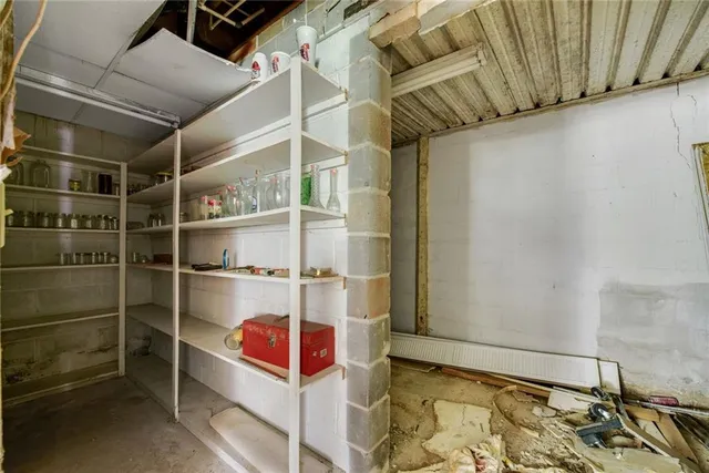 a bathroom with a sink and shower