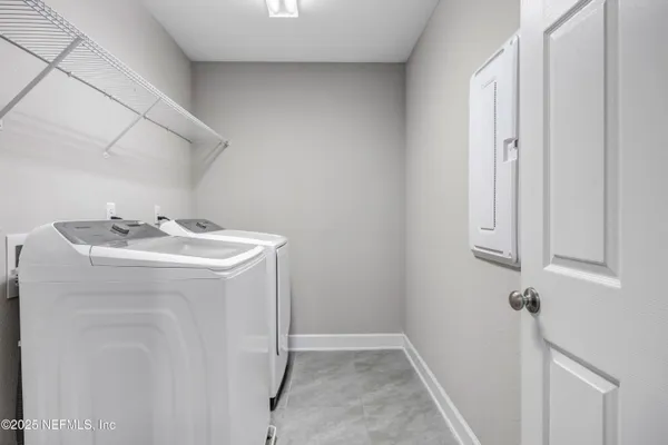 a utility room with dryer and washer