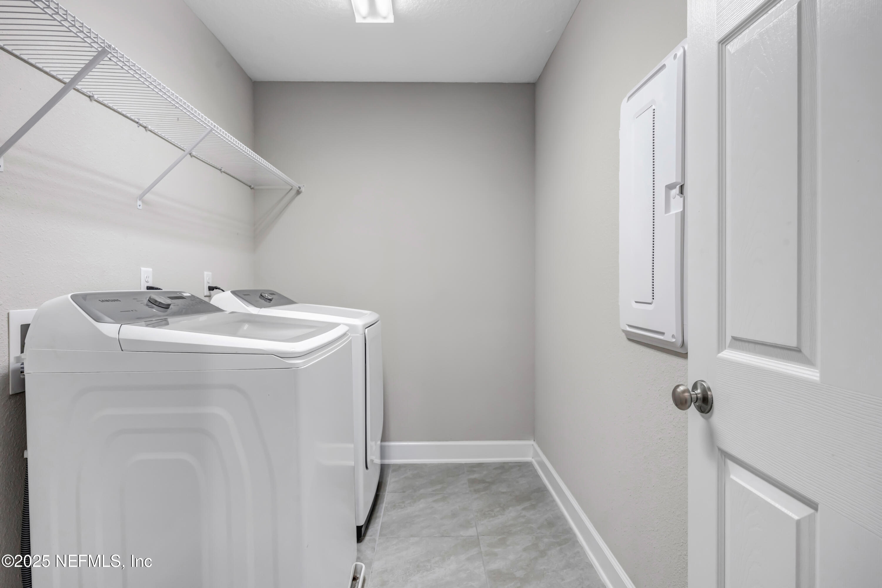 23 Catesby Lane St. Augustine, FL 32095 - Photo 24 of 31 a utility room with dryer and washer
