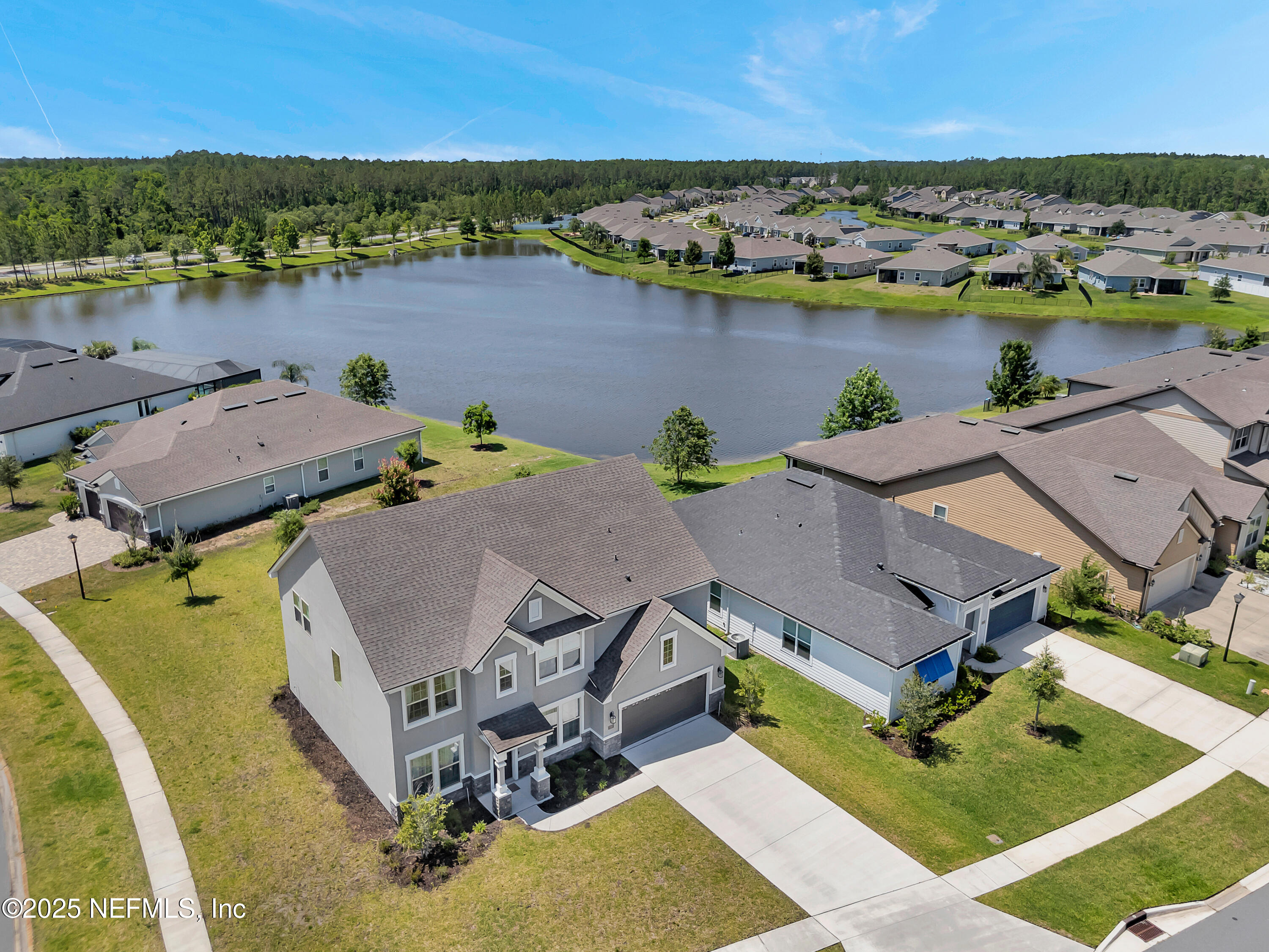23 Catesby Lane St. Augustine, FL 32095 - Photo 31 of 31 an aerial view of a house with outdoor space and lake view