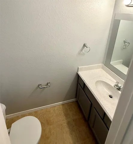 a bathroom with a sink and toilet