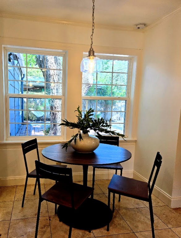 2108 Glendale Place Austin, TX 78704 - Photo 15 of 36 a view of a dining room with furniture and window