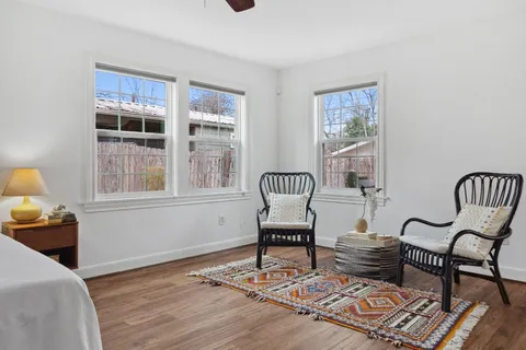 a kitchen with cabinets appliances and a window