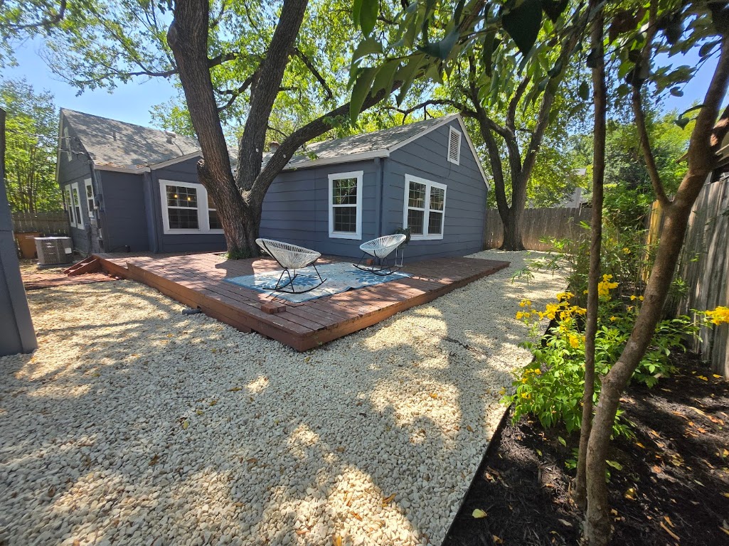 2108 Glendale Place Austin, TX 78704 - Photo 2 of 36 August 2025- newly landscaped backyard offers a zero-scape easy maintenance space with new native plants to enhance the flowerbeds