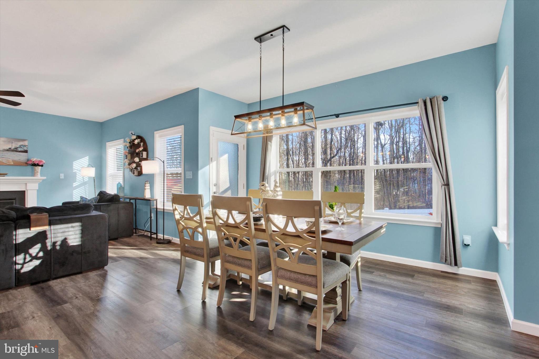 155 Sunbury Way Red Lion, PA 17356 - Photo 12 of 36 a dining room with furniture window wooden floor