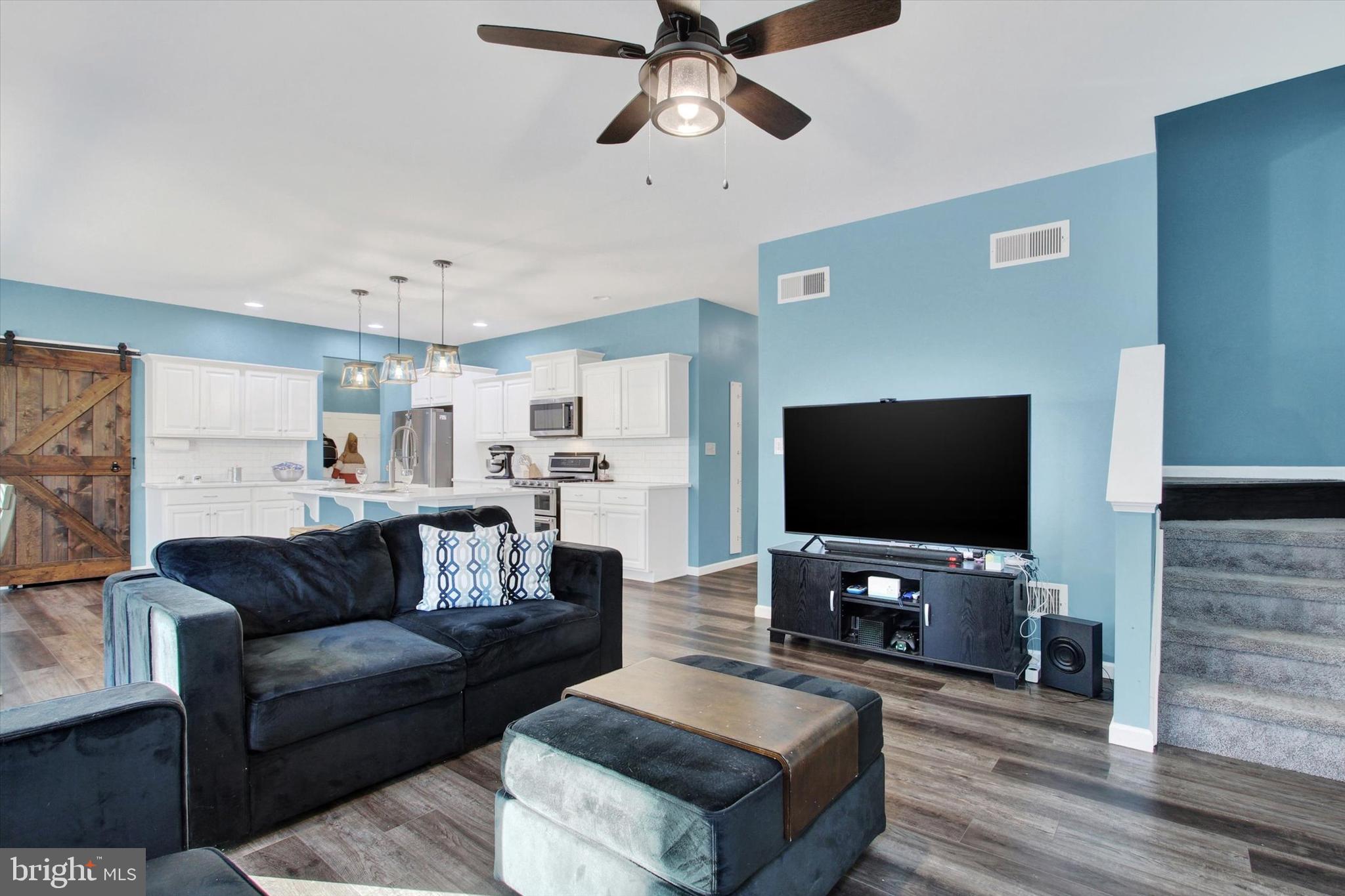 155 Sunbury Way Red Lion, PA 17356 - Photo 14 of 36 a living room with furniture and a flat screen tv