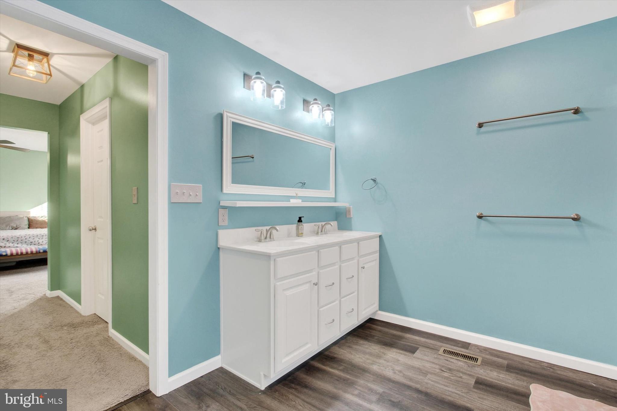 155 Sunbury Way Red Lion, PA 17356 - Photo 27 of 36 a bathroom with a sink a mirror and a shower
