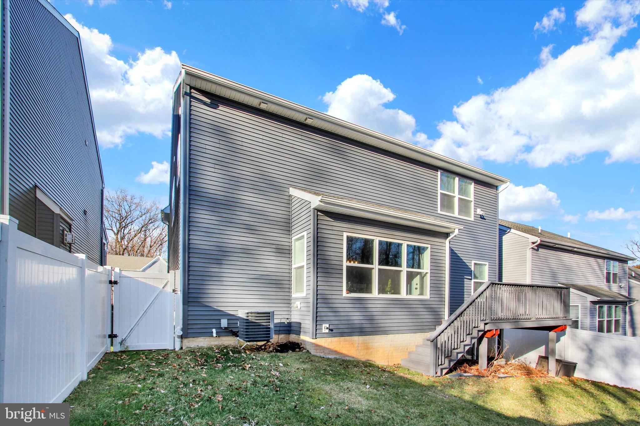 155 Sunbury Way Red Lion, PA 17356 - Photo 34 of 36 a backyard of a house with table and chairs