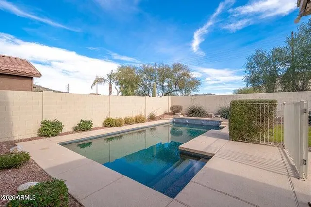 a view of balcony with furniture