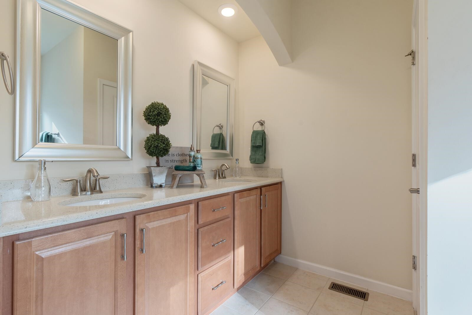 637 Edgewater Ridge Court Apex, NC 27523 - Photo 18 of 31 Dual vanity with lots of natural light