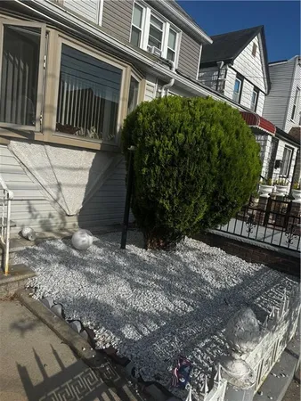 a view of a house with a street