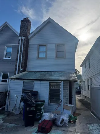 a front view of a house with parking space