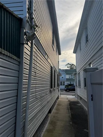 a view of a house with a street