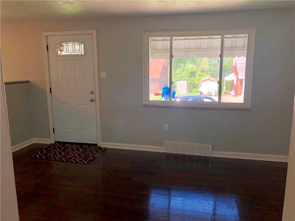1040 5th Street Baden, PA 15005 - Photo 16 of 25 a view of an empty room with a window