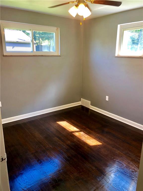 1040 5th Street Baden, PA 15005 - Photo 19 of 25 a view of empty room with wooden floor and fan
