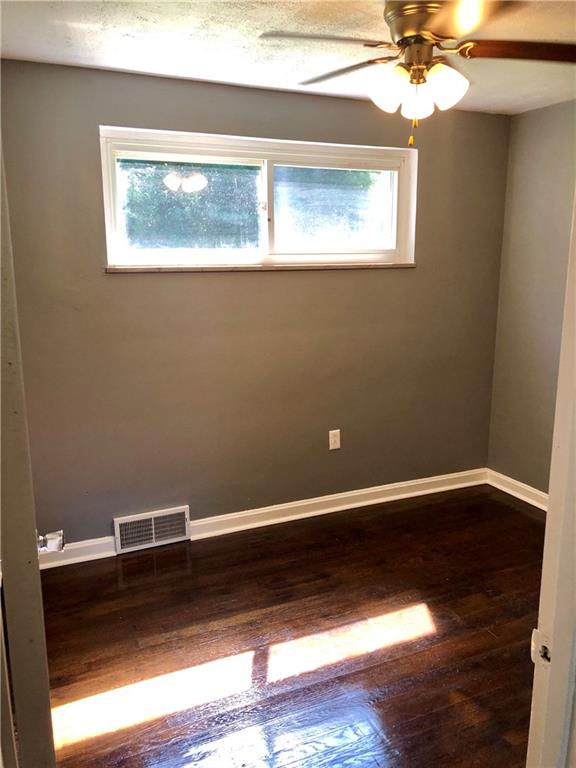 1040 5th Street Baden, PA 15005 - Photo 20 of 25 a view of room with window and wooden floor