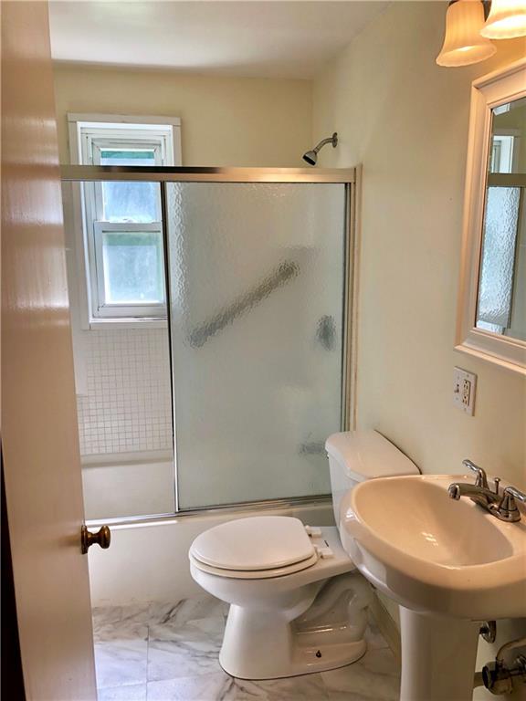 1040 5th Street Baden, PA 15005 - Photo 21 of 25 a bathroom with a toilet sink and shower