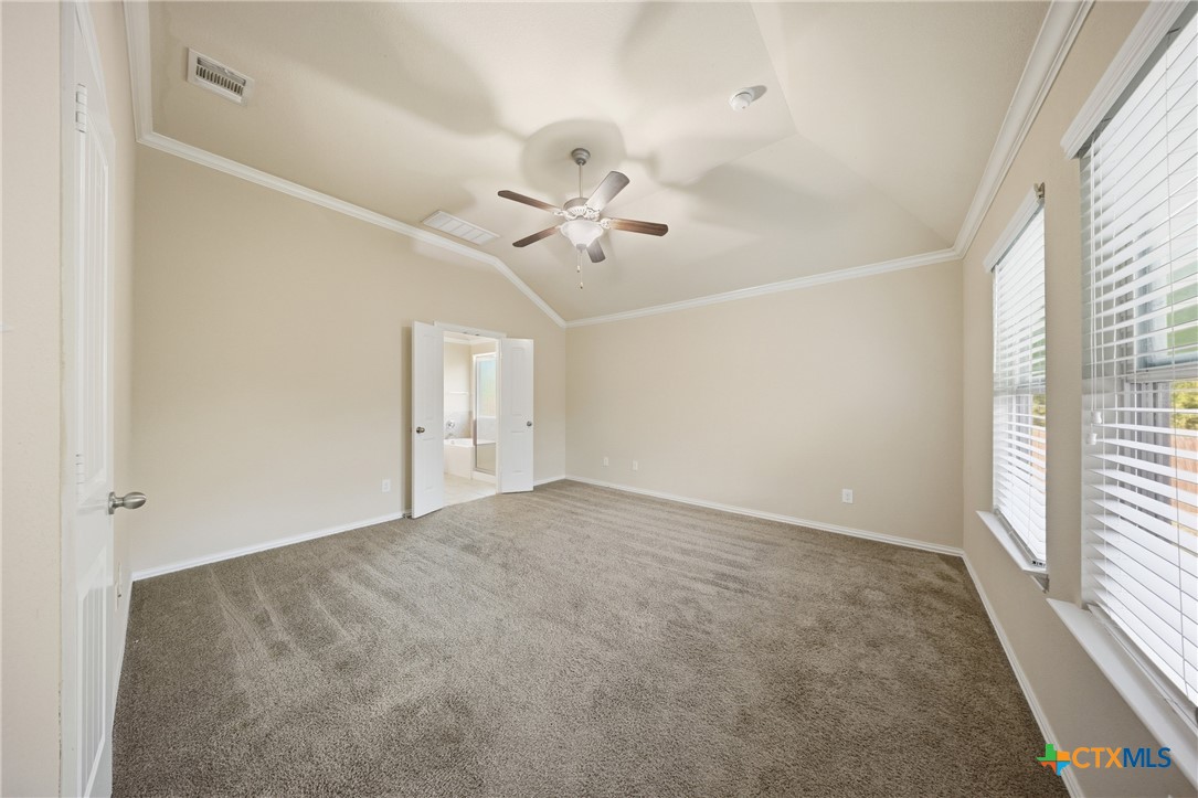 728 Olaf Drive Temple, TX 76504 - Photo 11 of 26 wooden floor in an empty room with a window