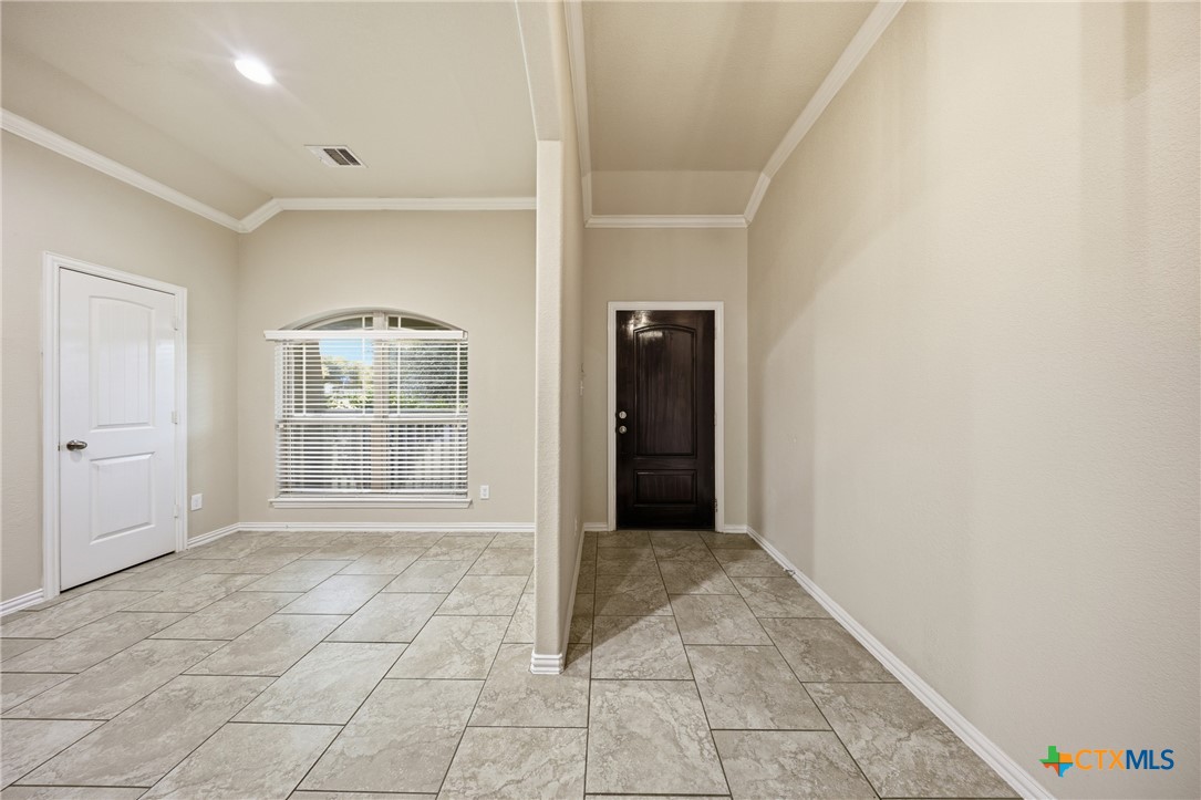 728 Olaf Drive Temple, TX 76504 - Photo 4 of 26 a view of an empty room with a window