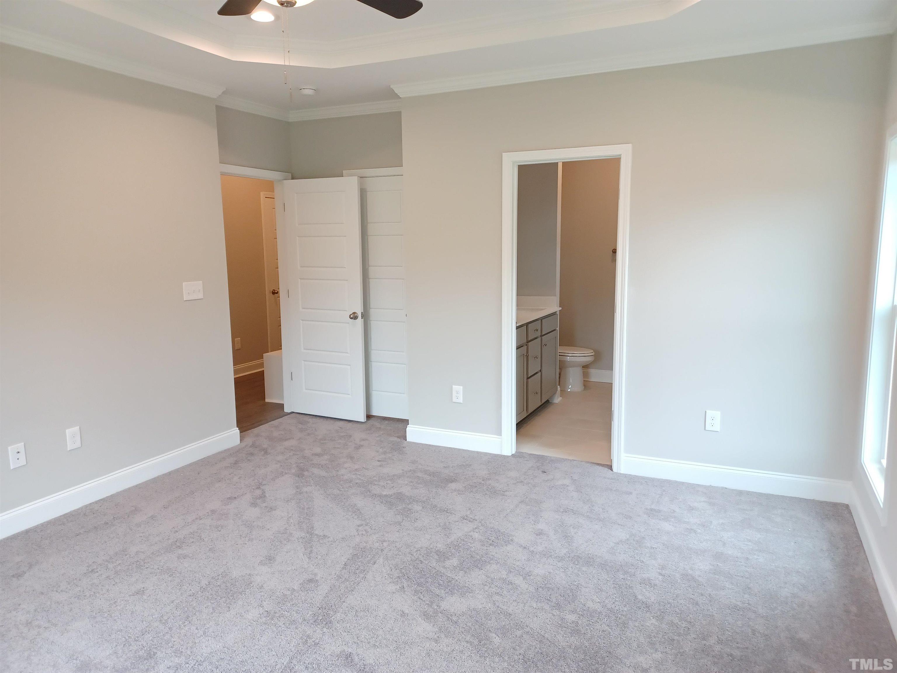 184 Howards Crossing Drive Wendell, NC 27591 - Photo 11 of 27 a view of an empty room with a closet