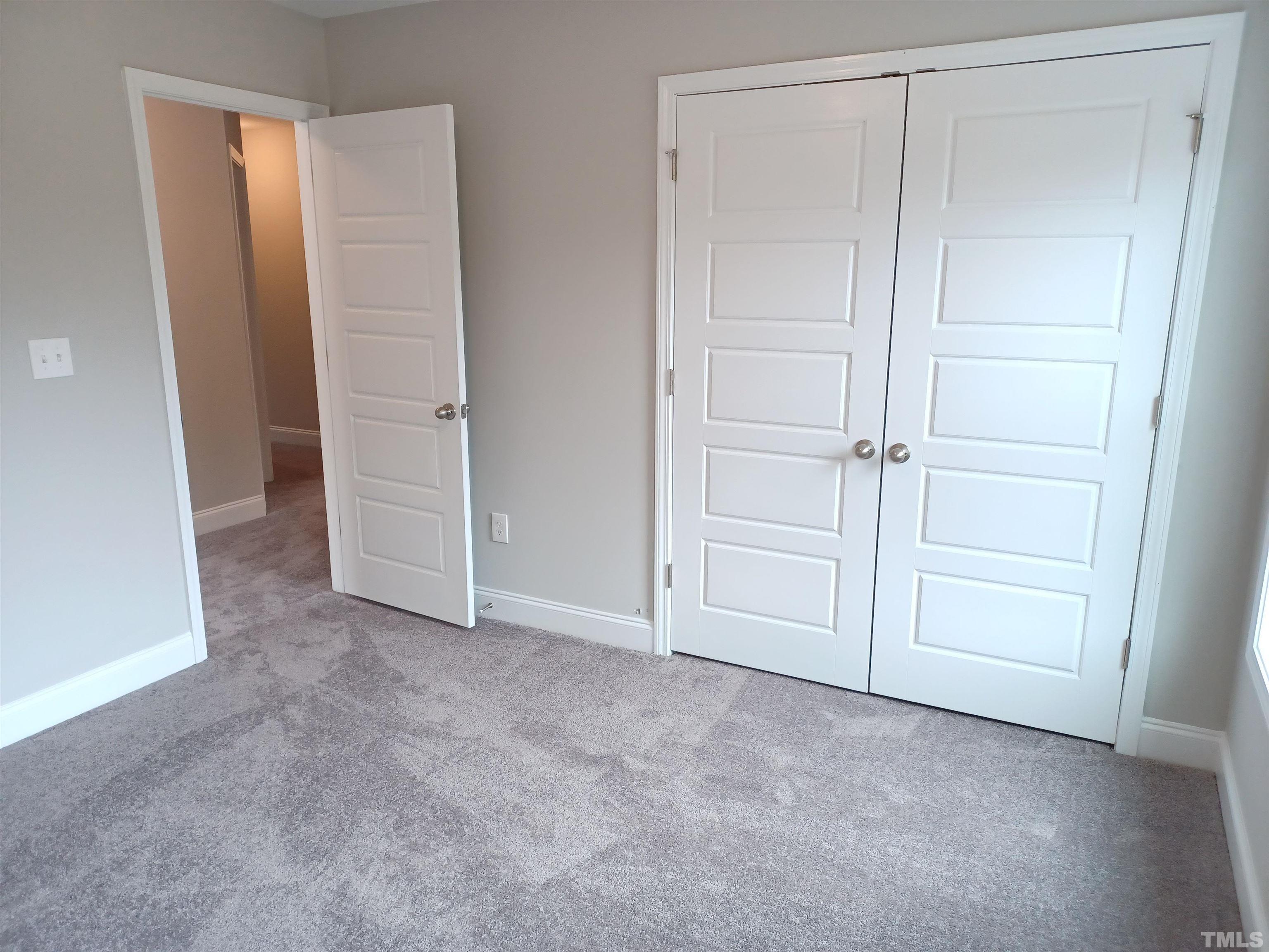 184 Howards Crossing Drive Wendell, NC 27591 - Photo 17 of 27 a view of an empty room