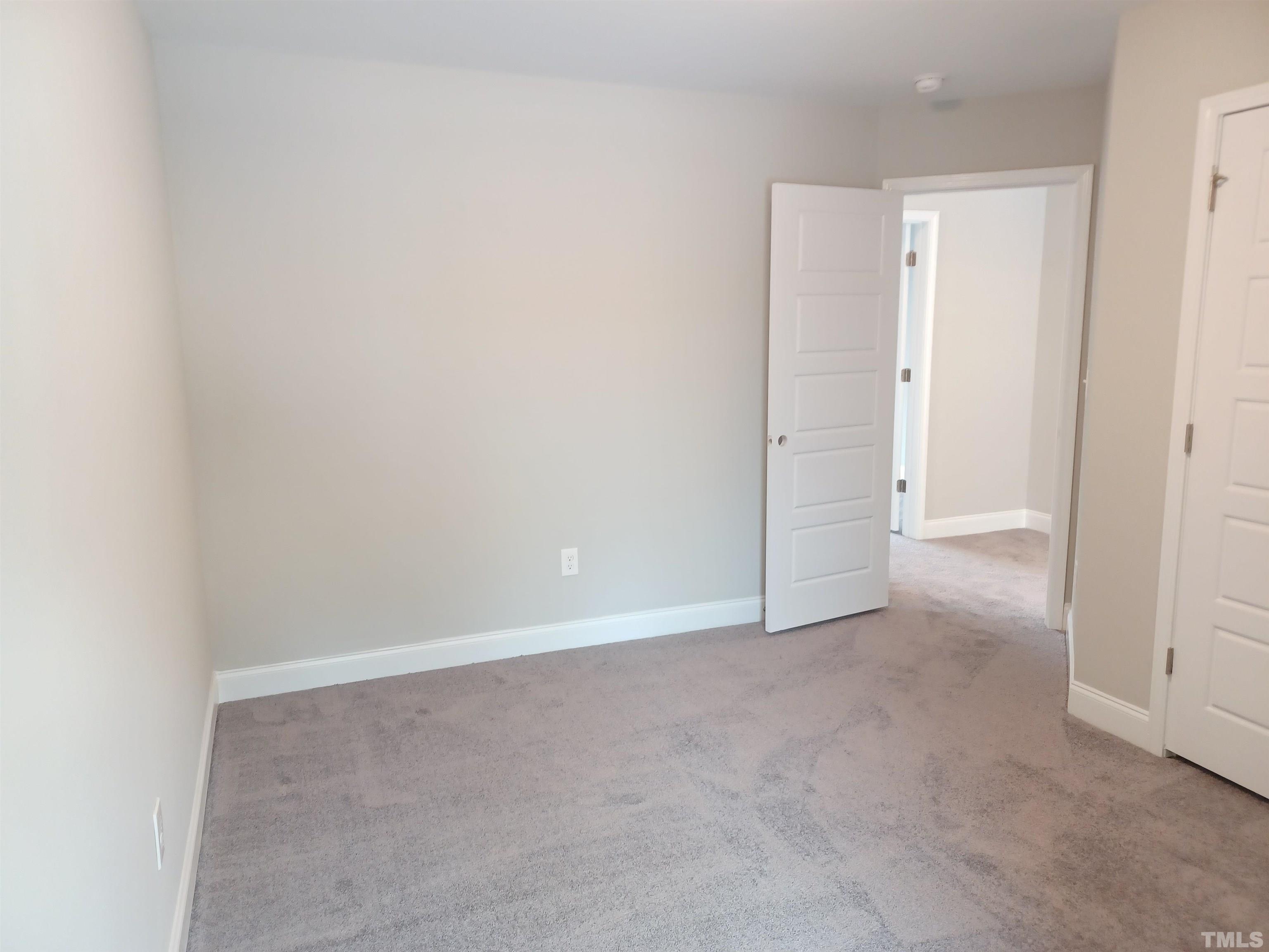 184 Howards Crossing Drive Wendell, NC 27591 - Photo 23 of 27 a view of an empty room