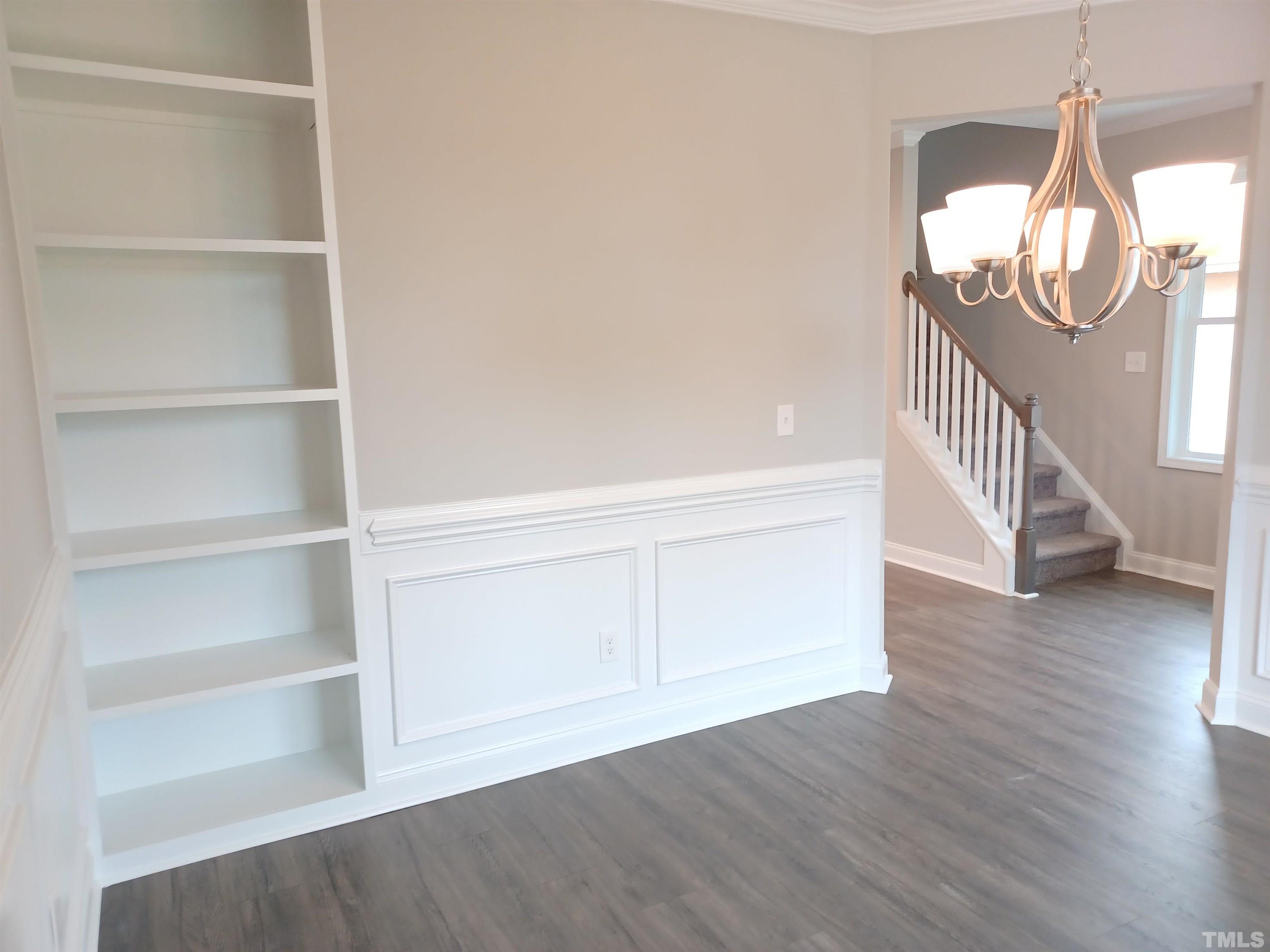 184 Howards Crossing Drive Wendell, NC 27591 - Photo 7 of 27 a view of an entryway with wooden floor