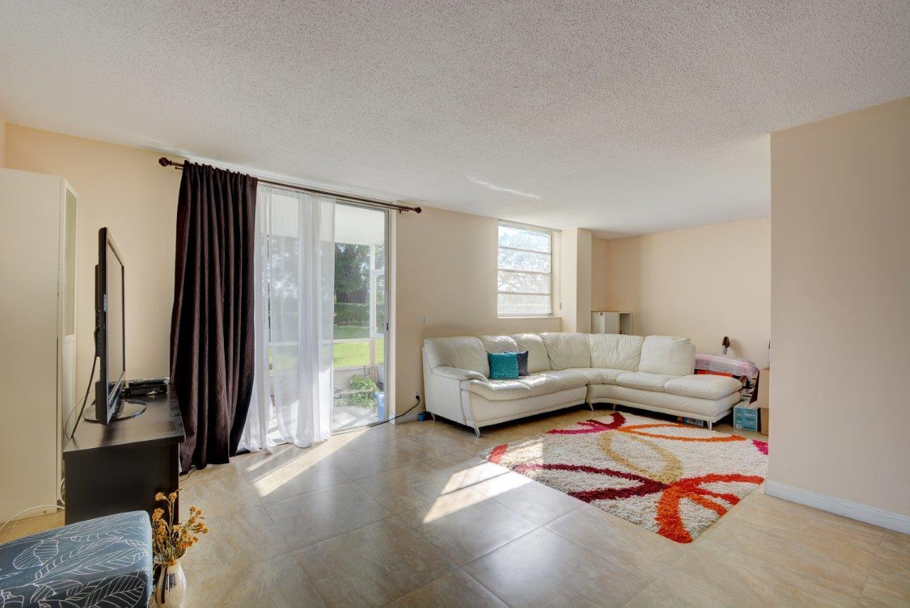 5500 Northwest 2nd Avenue, Unit 122 Boca Raton, FL 33487 - Photo 5 of 13 LIVING ROOM/DEN