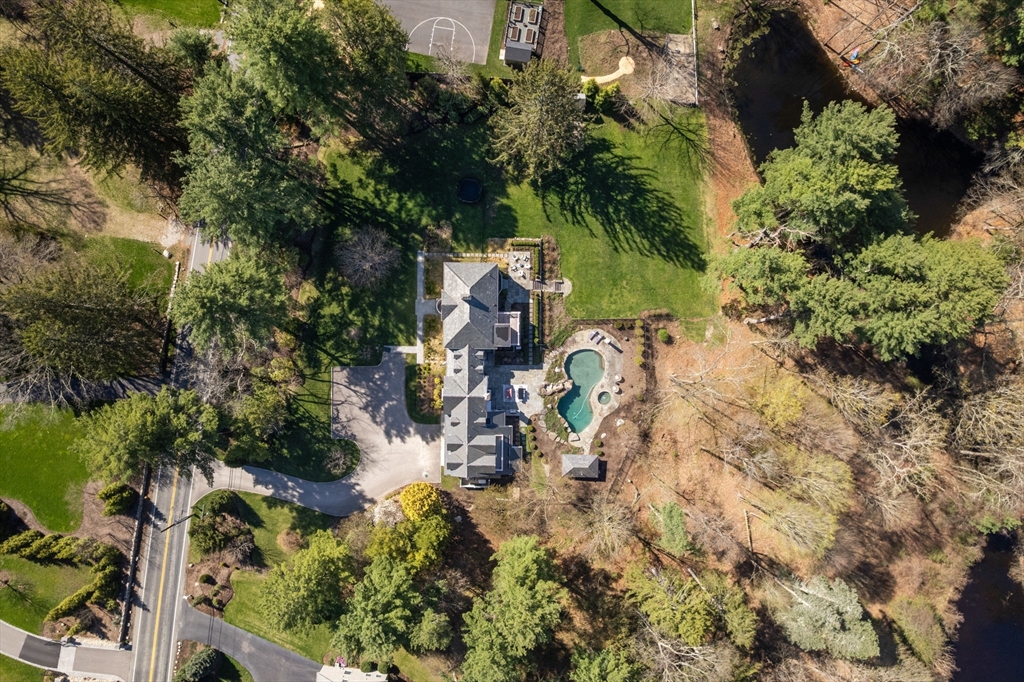 389 Grove Street Needham, MA 02492 - Photo 39 of 40 an aerial view of residential house with outdoor space and trees all around