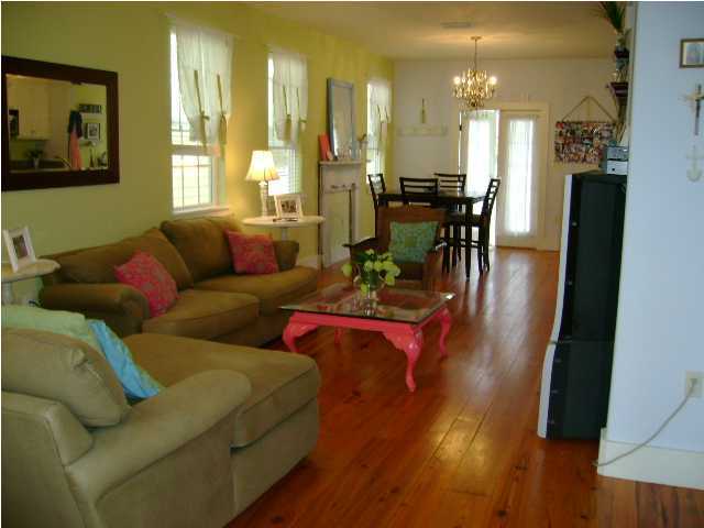 1594 Co Road North Santa Rosa Beach, FL 32459 - Photo 5 of 11 a living room with furniture and wooden floor