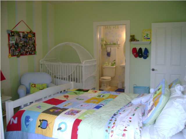 1594 Co Road North Santa Rosa Beach, FL 32459 - Photo 7 of 11 a bedroom that has a bed and a table in it