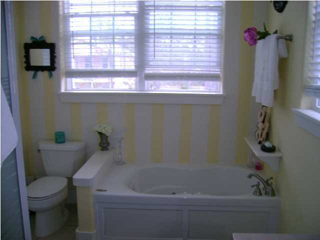 1594 Co Road North Santa Rosa Beach, FL 32459 - Photo 8 of 11 a bath room with a toilet and a bath tub