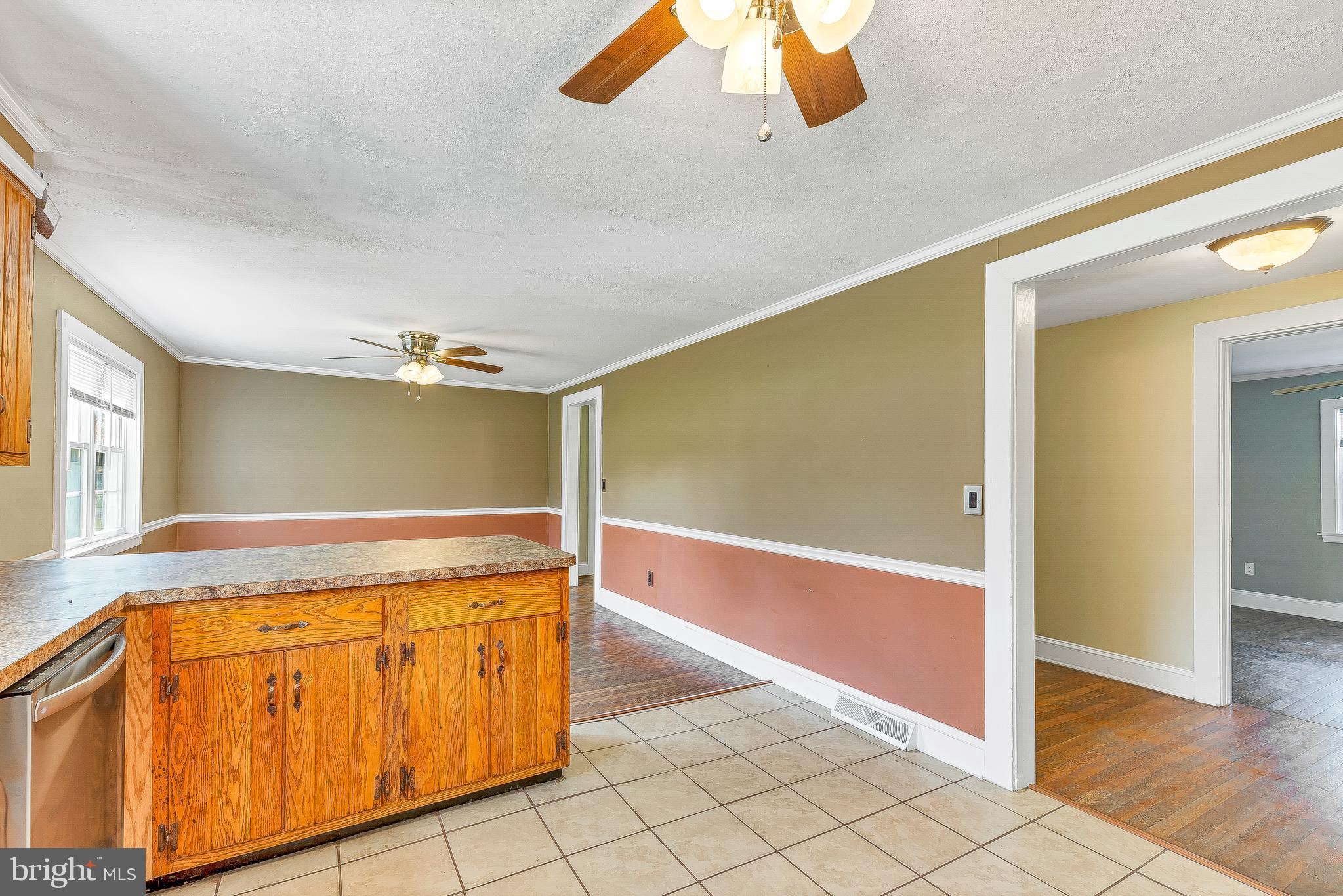 49264 Bennett Drive Ridge, MD 20680 - Photo 13 of 27 Kitchen leads to family room