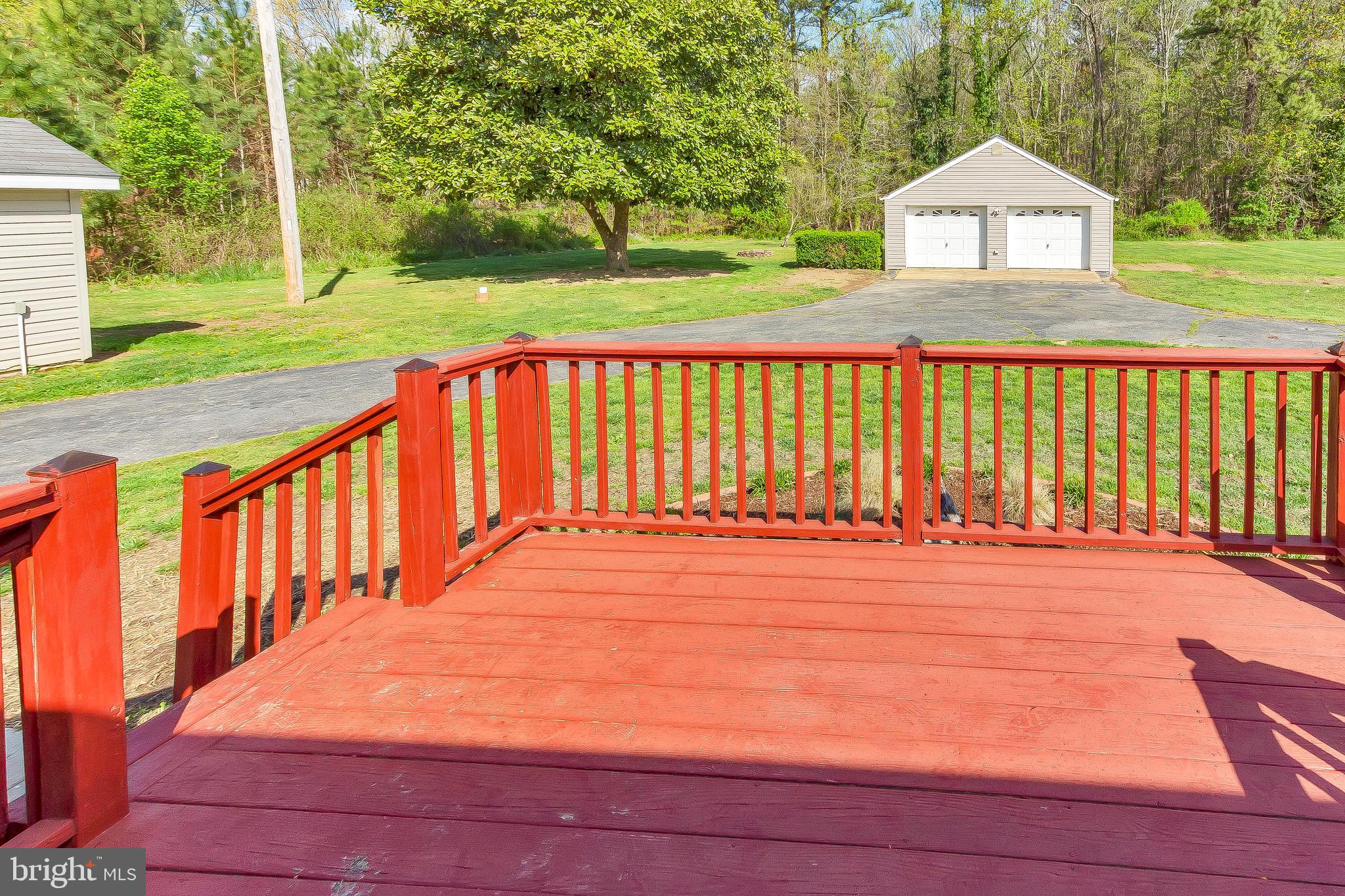 49264 Bennett Drive Ridge, MD 20680 - Photo 23 of 27 Back deck leads to backyard