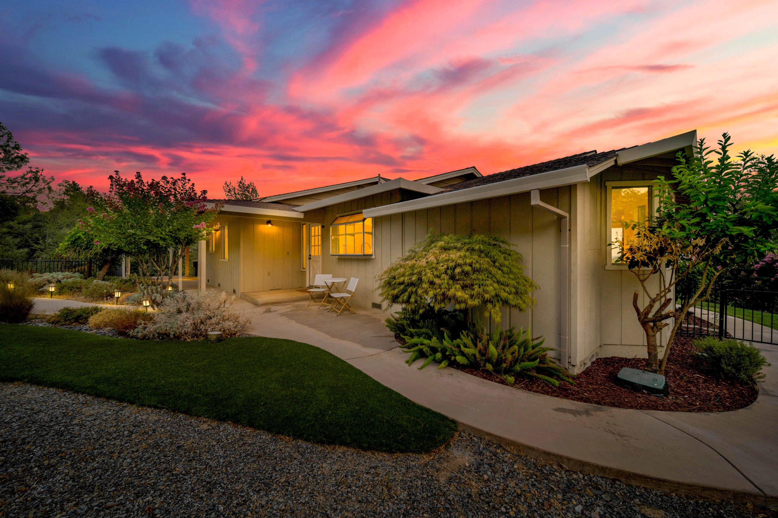 1705 Barbara Road Redding, CA 96003 - Photo 7 of 103 a front view of a house with garden