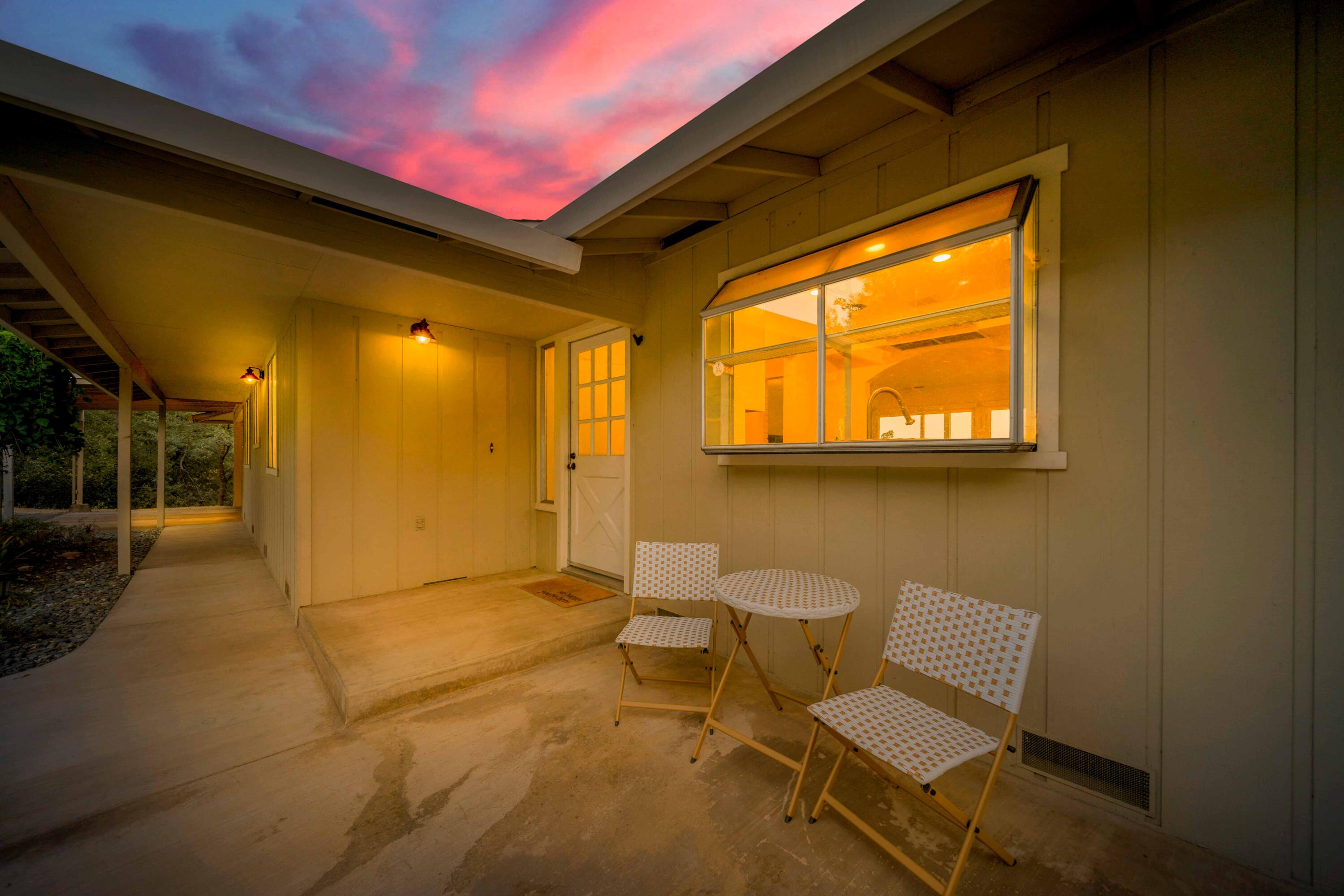 1705 Barbara Road Redding, CA 96003 - Photo 8 of 103 a view of a patio with table and chairs