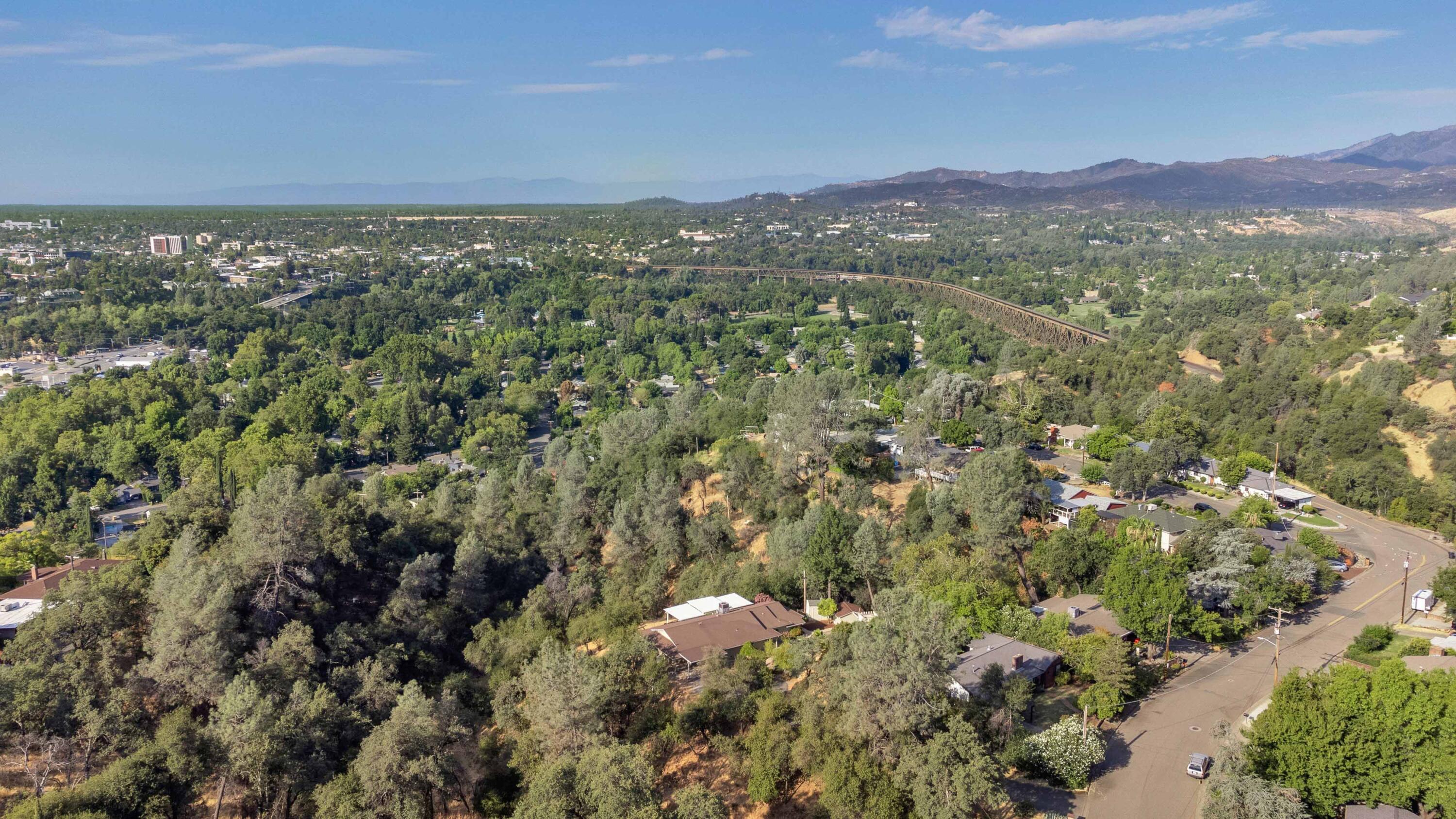 1705 Barbara Road Redding, CA 96003 - Photo 93 of 103 a view of a city with green field and mountains