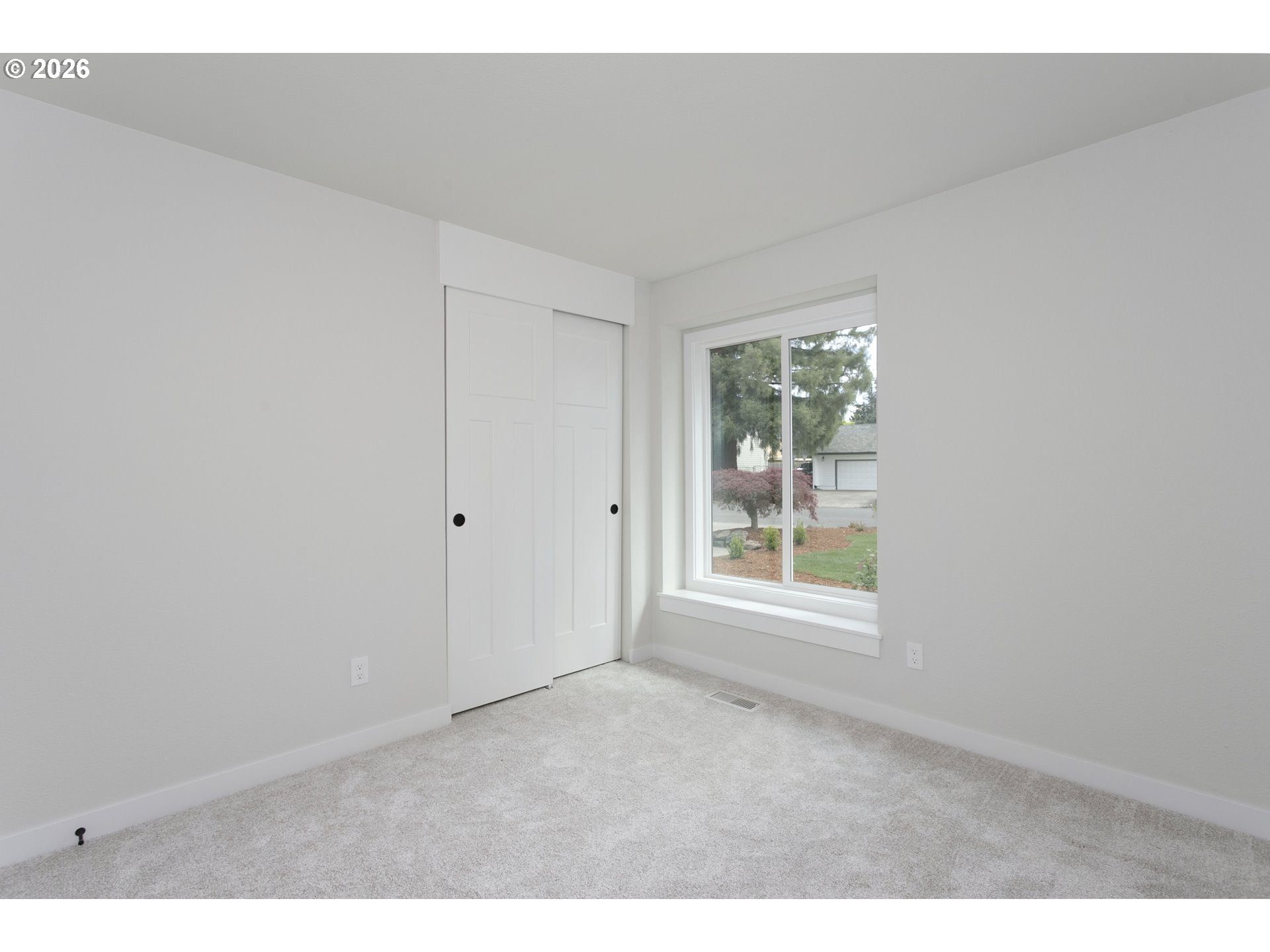 174 Southwest 10th Avenue Canby, OR 97013 - Photo 26 of 31 a view of an empty room with a window