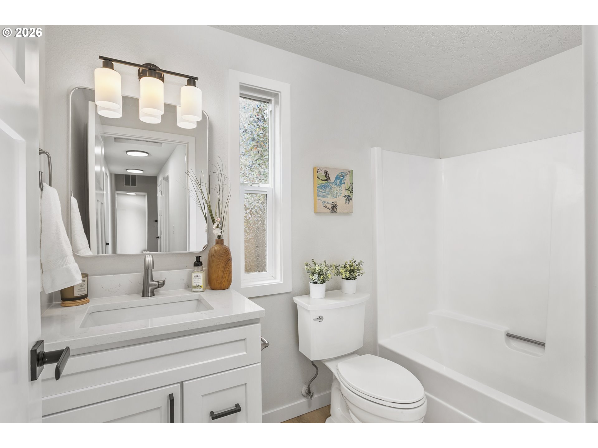 174 Southwest 10th Avenue Canby, OR 97013 - Photo 27 of 31 a bathroom with a sink toilet and shower