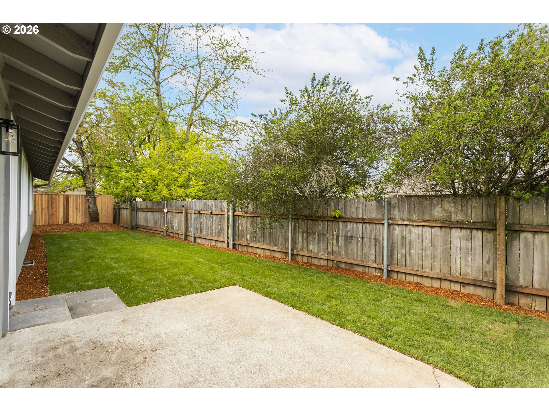 174 Southwest 10th Avenue Canby, OR 97013 - Photo 30 of 31 a garden with wooden fence
