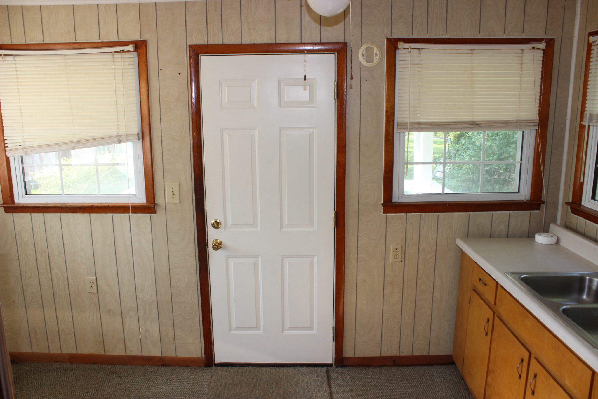 512 Limestone Road Elora, TN 37328 - Photo 14 of 44 a view of a kitchen with a sink and a window