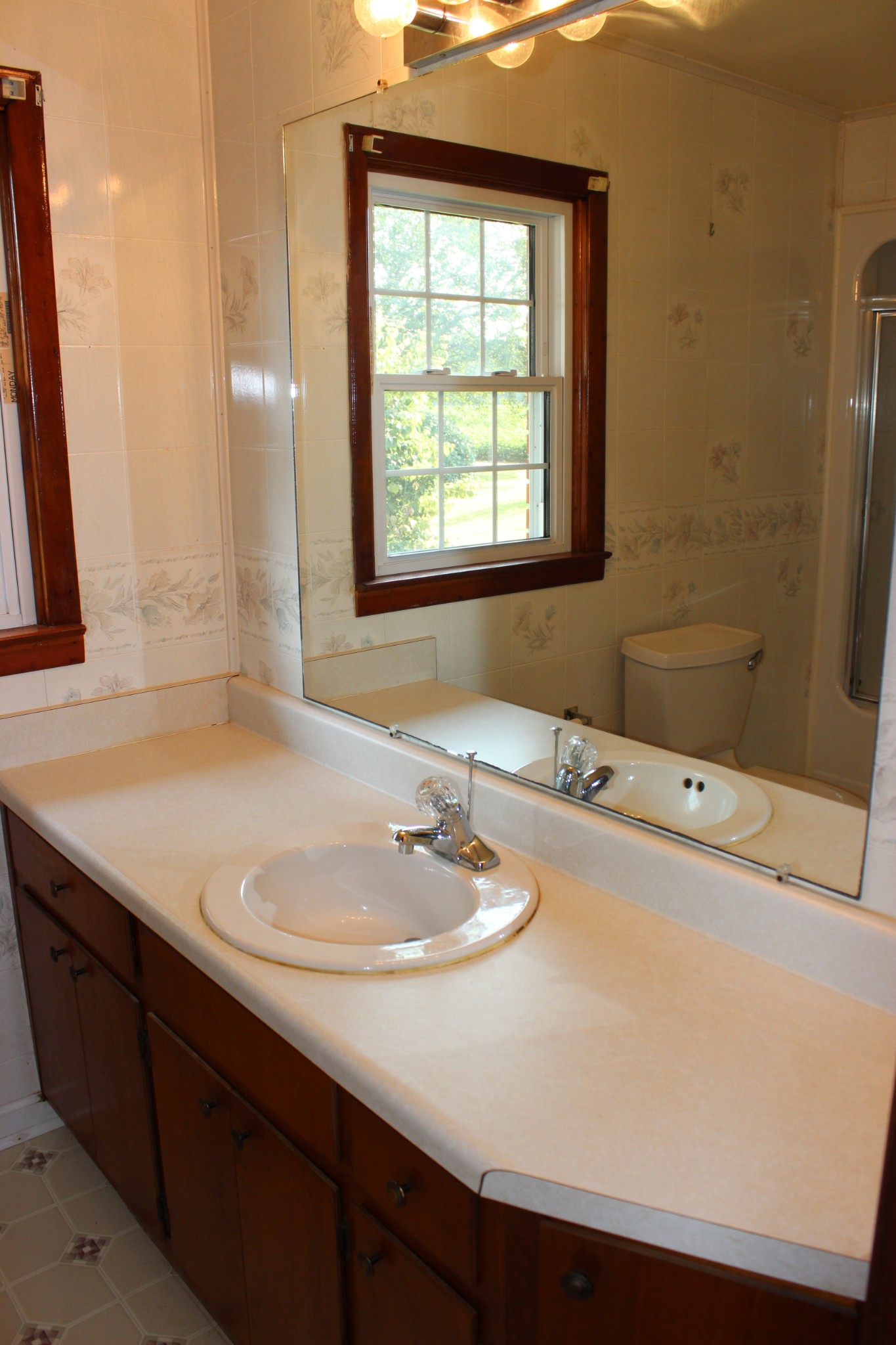 512 Limestone Road Elora, TN 37328 - Photo 17 of 44 a bathroom with a sink a vanity and a mirror