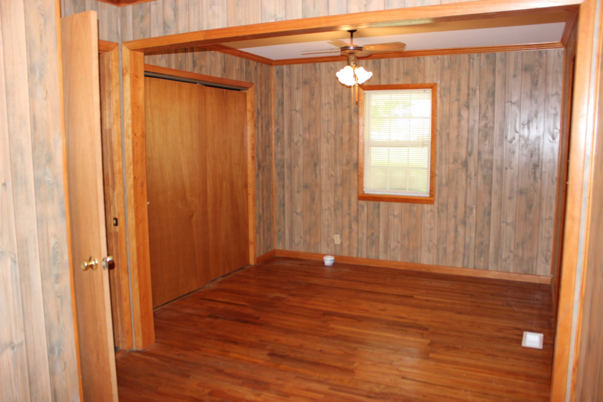 512 Limestone Road Elora, TN 37328 - Photo 18 of 44 a view of a small space with wooden floor and a window