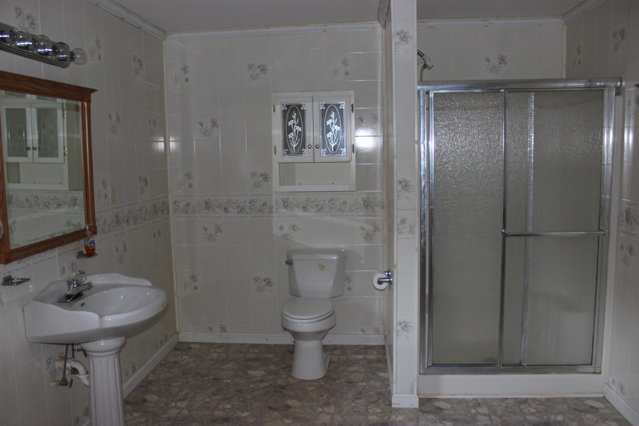 512 Limestone Road Elora, TN 37328 - Photo 27 of 44 a bathroom with a sink a toilet and shower