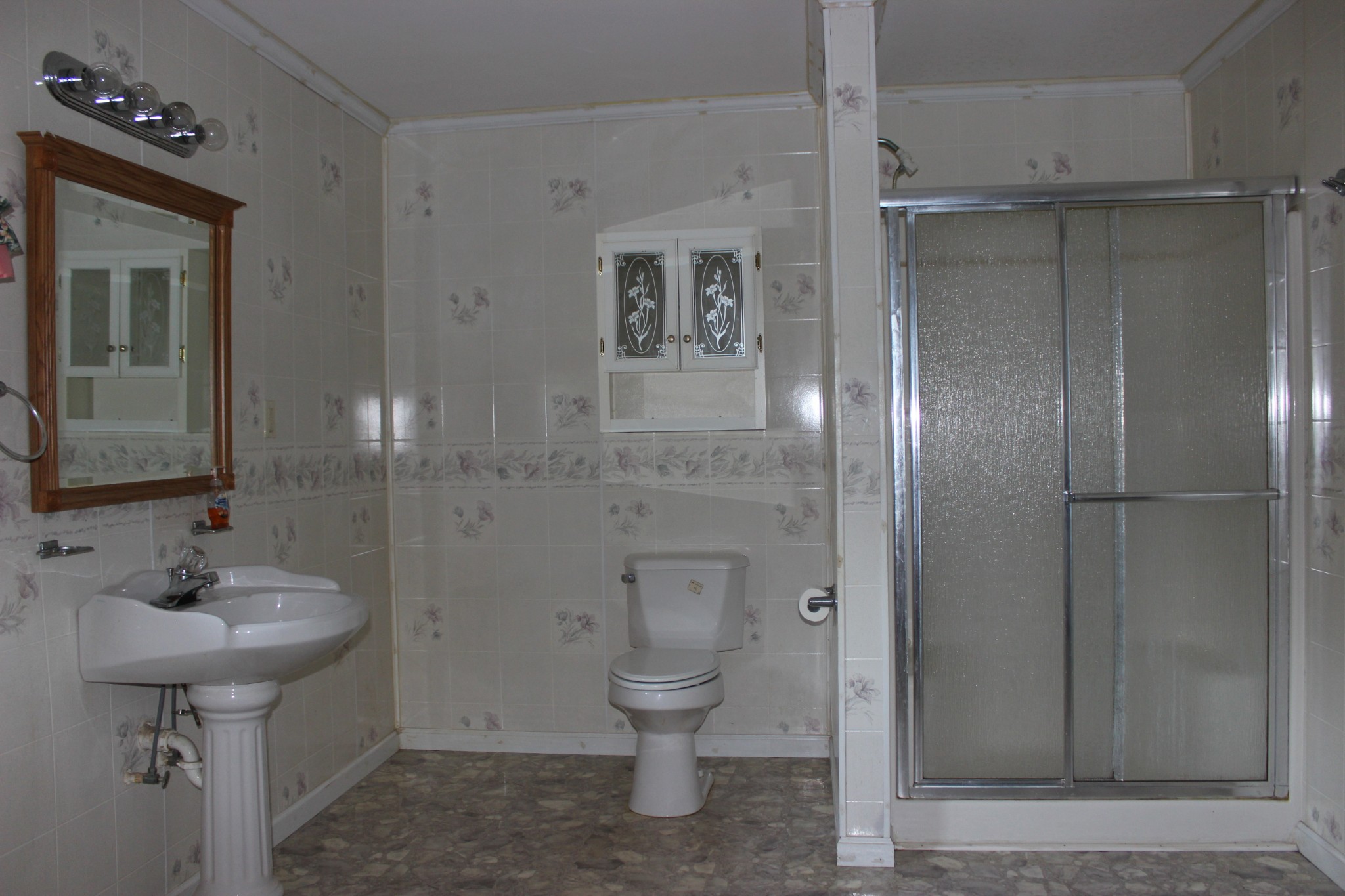 512 Limestone Road Elora, TN 37328 - Photo 28 of 44 a bathroom with a sink toilet and shower