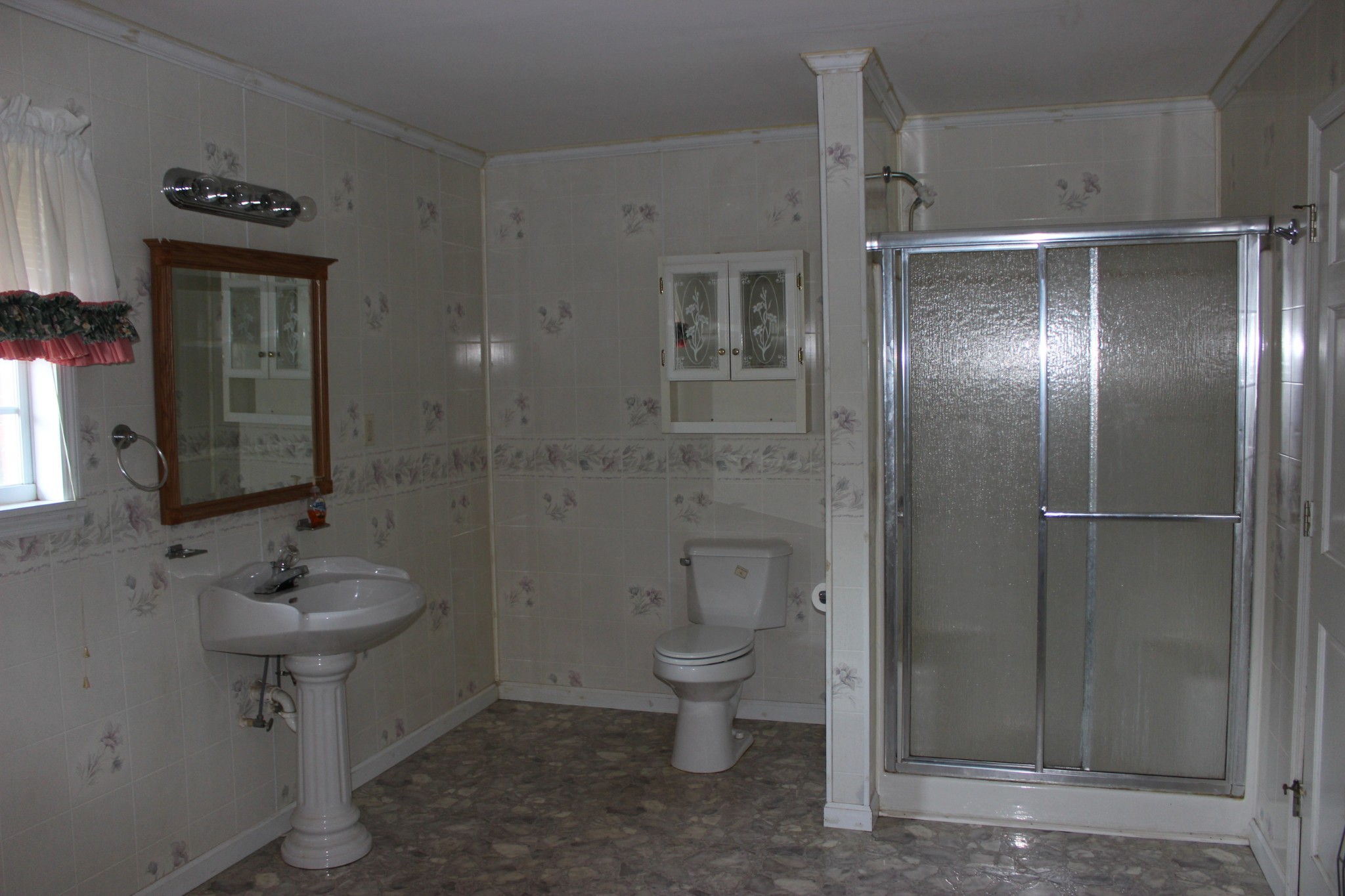 512 Limestone Road Elora, TN 37328 - Photo 29 of 44 a bathroom with a sink toilet and shower